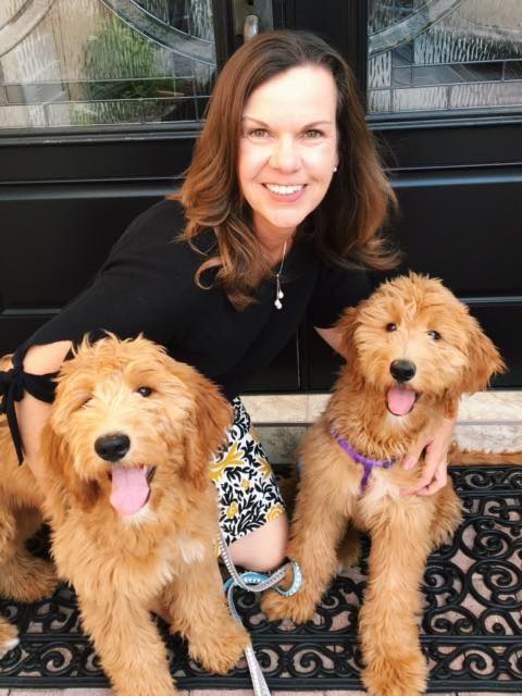 interior designer Kathie Golson with her Golden Doodles